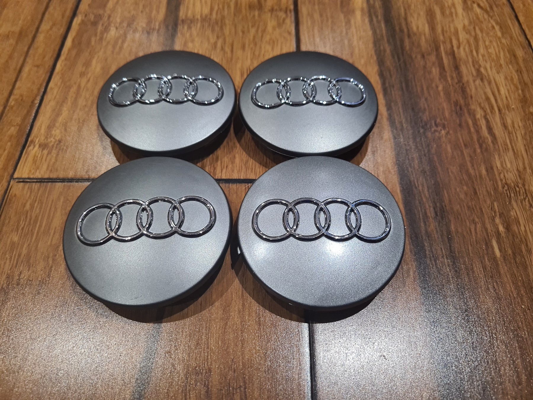 thumbnail image 2 of 4 Matte Silver Audi Center Caps - 60mm Outer Diameter, 56mm Inner, Alloy Wheels (A1 A3 A4 A5 A6 Q5 Q7) 2 of 4