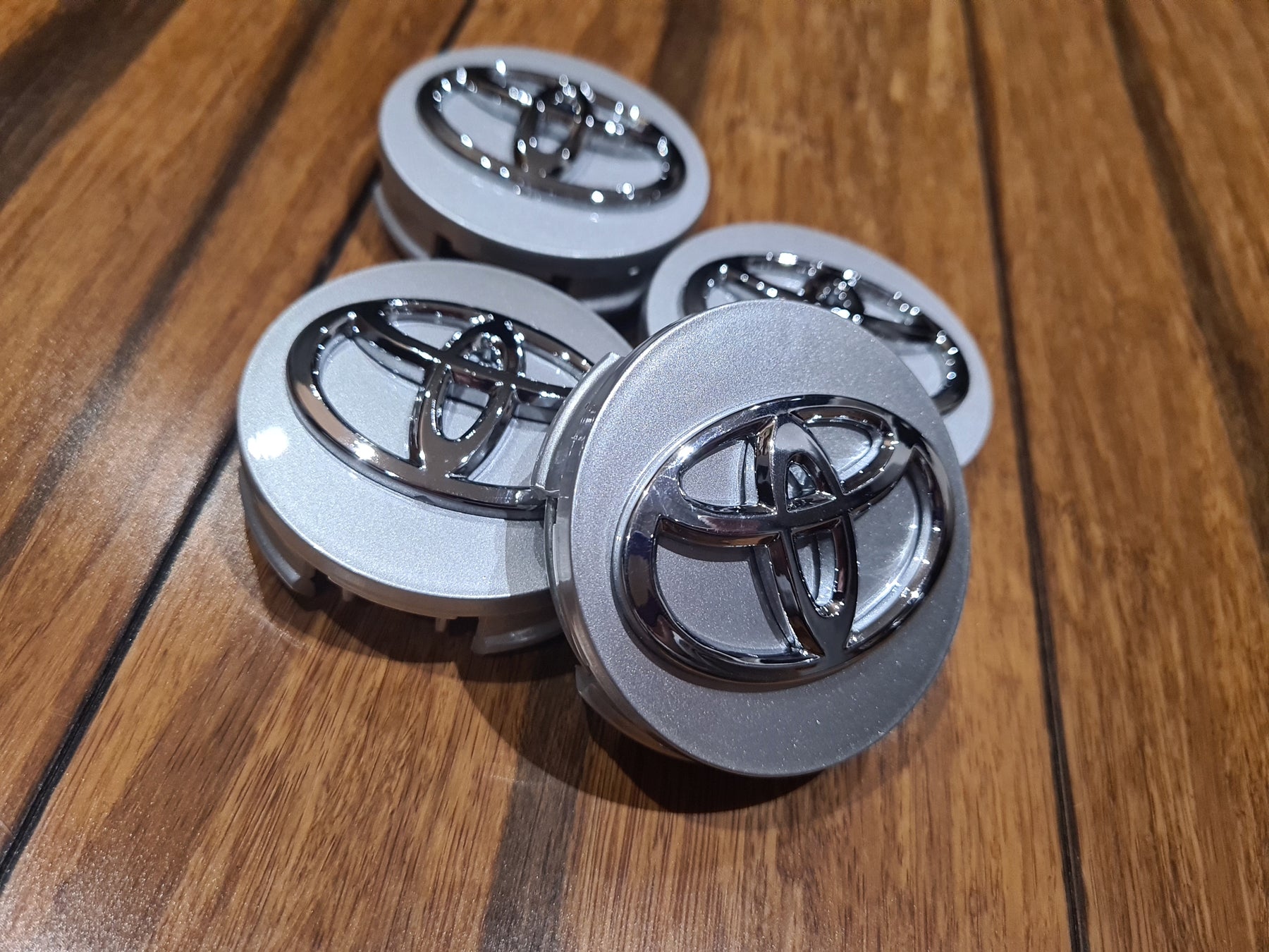 4x Toyota Wheel Center Hub Caps – 62mm Black Base With Chrome Logo, Remanufactured